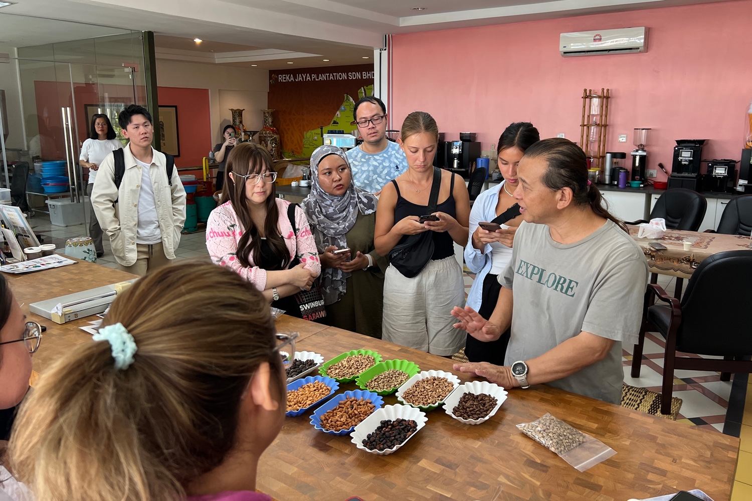 Mr Edward Yong (right) speaks with the students.