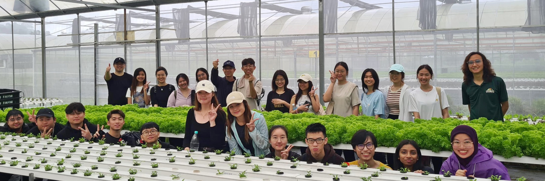 A group photo of the students at SKH Farming.