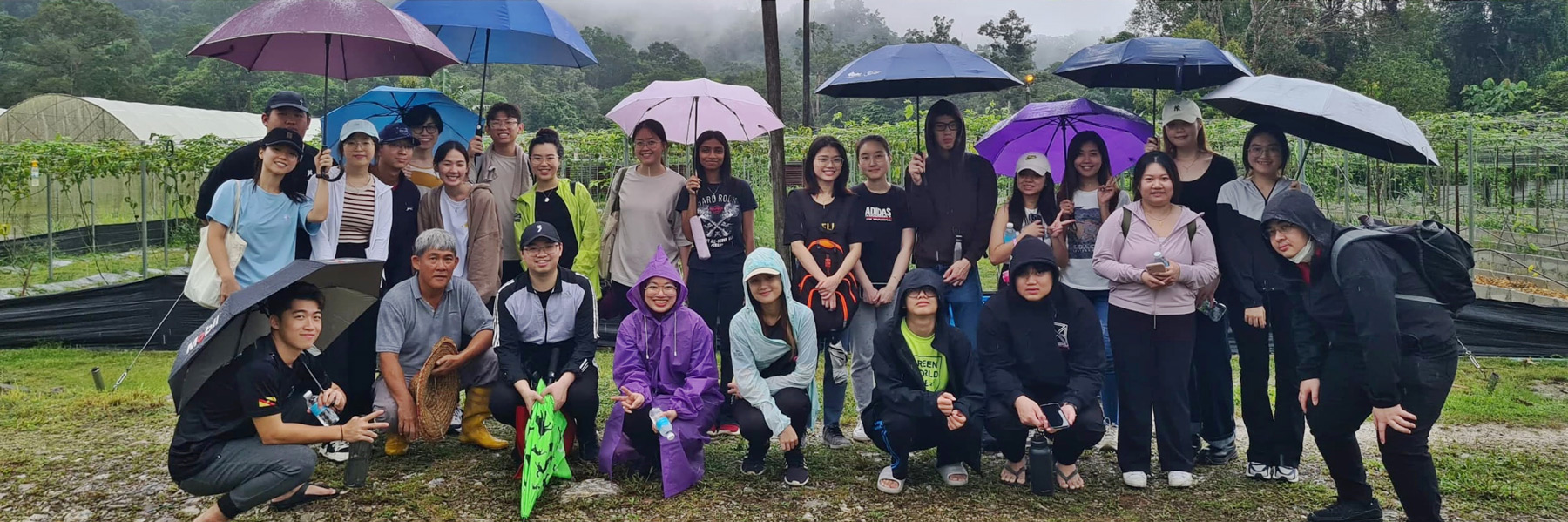 A group photo of the students at SKH Farming.