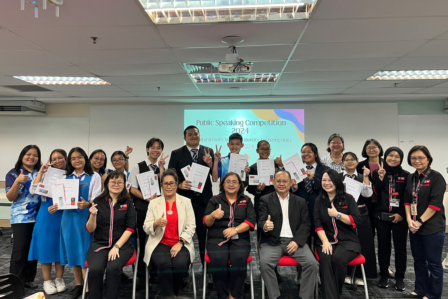 A group photo taken during the Public Speaking Workshop and Competition 2024.