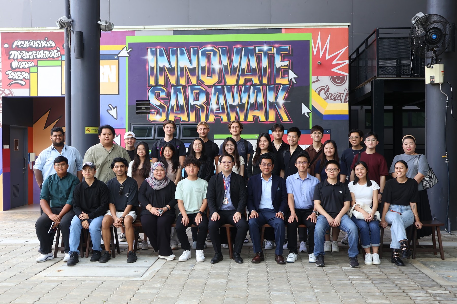 Dr Wee (seated, sixth right) with students at the TEGAS Speaker Series Program, an initiative integrated into the curriculum, where students gain hands-on experience in a real-world start-up environment as part of their entrepreneurial learning journey.