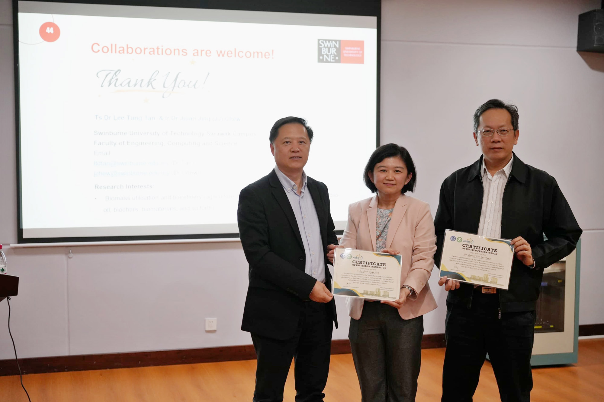 Certificates of appreciation are presented to Ir Dr Chew Jiuan Jing (centre) and Ts Dr Daniel Tan (right) at the closing ceremony of the International Symposium of ASEAN Countries on Biomass Conversion and its Applications.