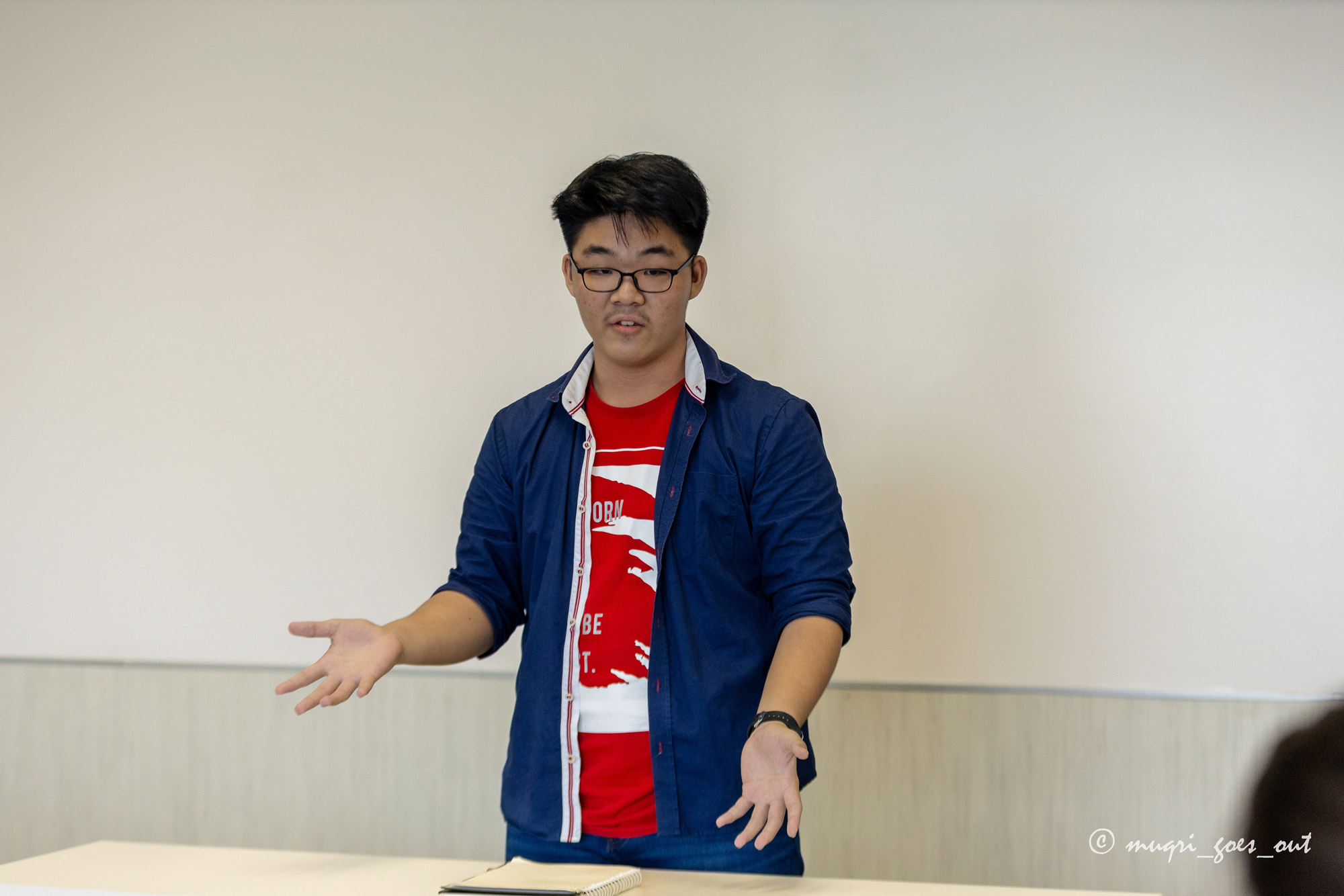 A student in action during a practice debate. 